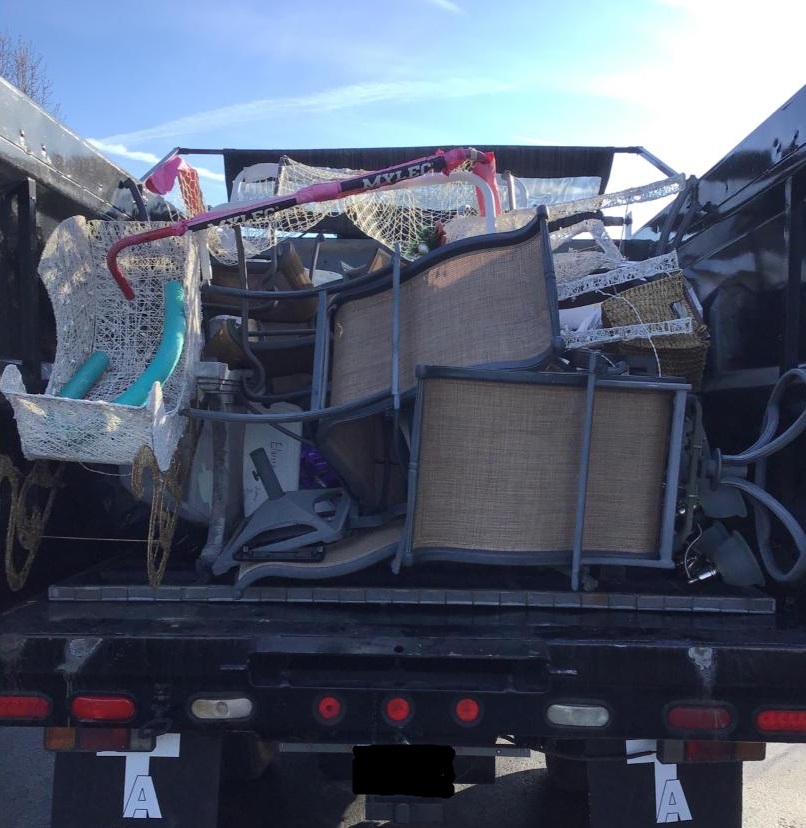 Junk removal truck full of junk from a foreclosure cleanout in Pennsylvania